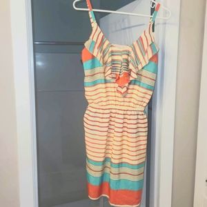 Gianna Bini. Adjustable straps. Hidden pockets. Multi layered around neckline